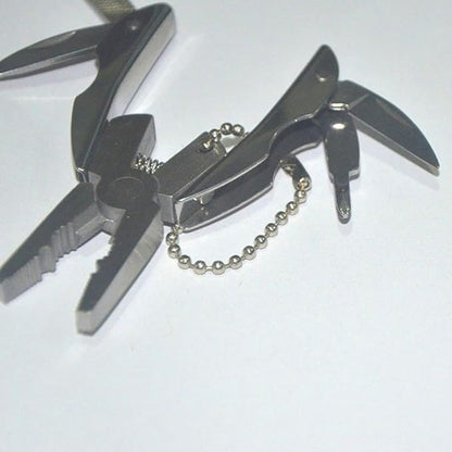 1Pc Silvery 7 in 1 Multifunctional Stainless Steel Pliers,Mini Folding Multi Tools Set Key Chain,Multi Tools Kits Wire Strippers for Outdoor Fishing Camping Hiking Multitools and Accessories